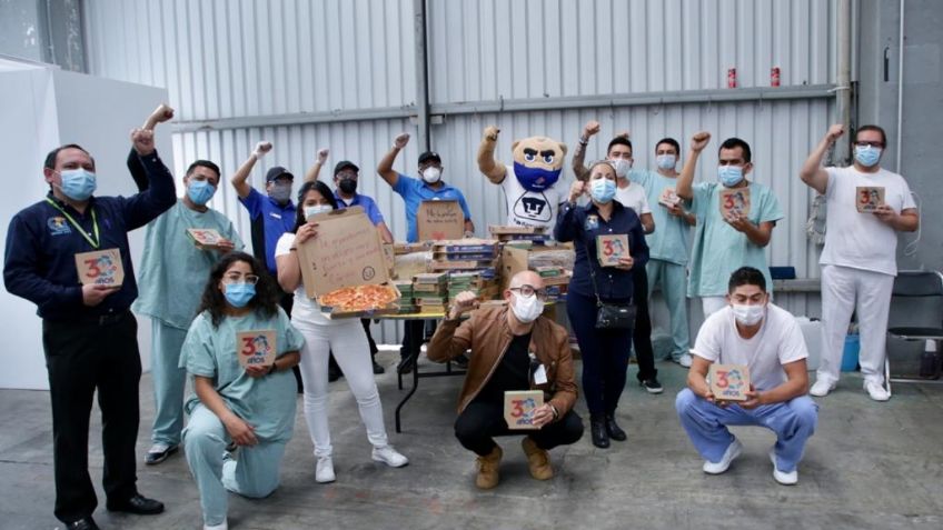 Pumas reparte pizzas a personal de salud en Hospital de Expansión Covid-19
