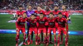Foto ilustrativa de la nota titulada: Xolos de Tijuana y su curiosa superstición en la Liga MX: sólo juegan con tachones rojos